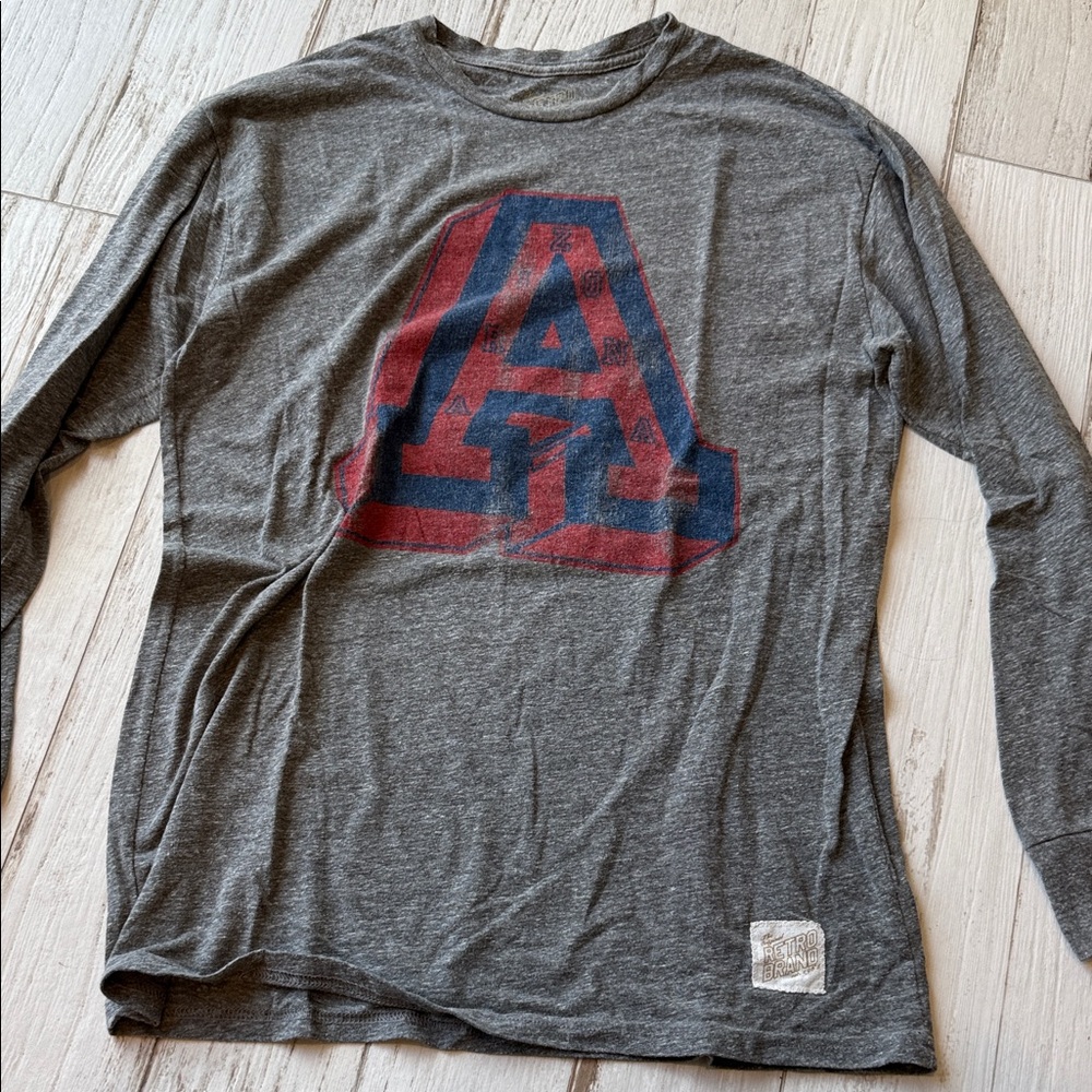 Original Retro Brand Men's Long Sleeve Gray Tee with Red and Blue Graphic